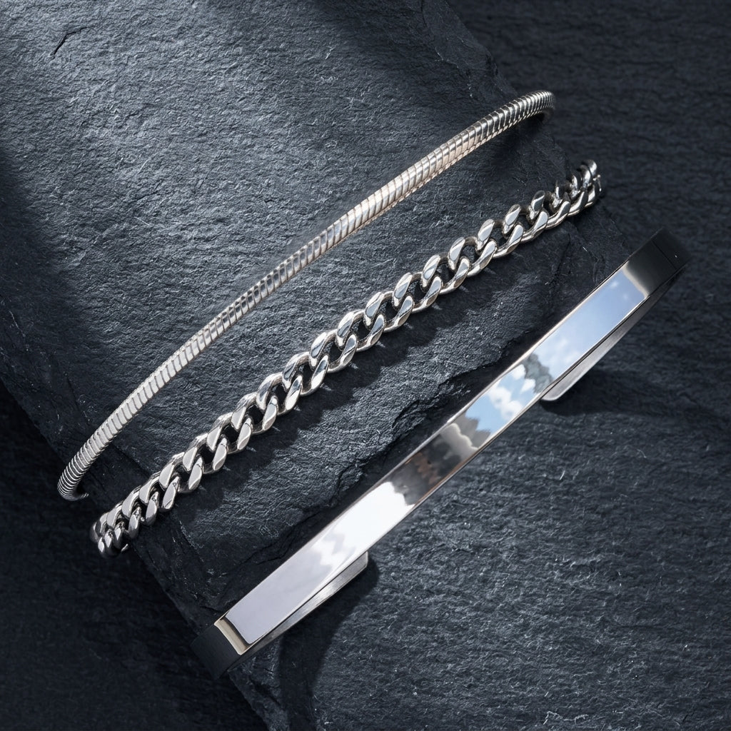 Black bracelet set on concrete block